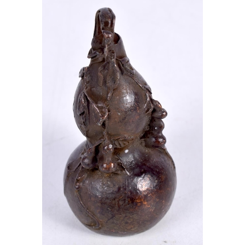 1582 - A JAPANESE BRONZE GOURD OKIMONO. 246 grams. 7cm x 4 cm.