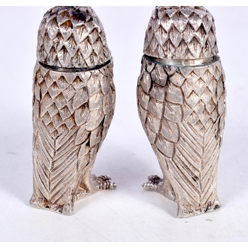 1588 - A PAIR OF SILVER OWL CONDIMENTS. 125 grams. 5.75 cm x 2.75 cm.