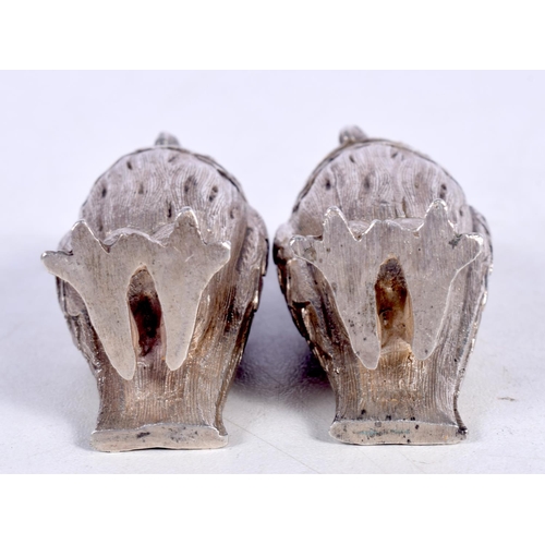 1588 - A PAIR OF SILVER OWL CONDIMENTS. 125 grams. 5.75 cm x 2.75 cm.