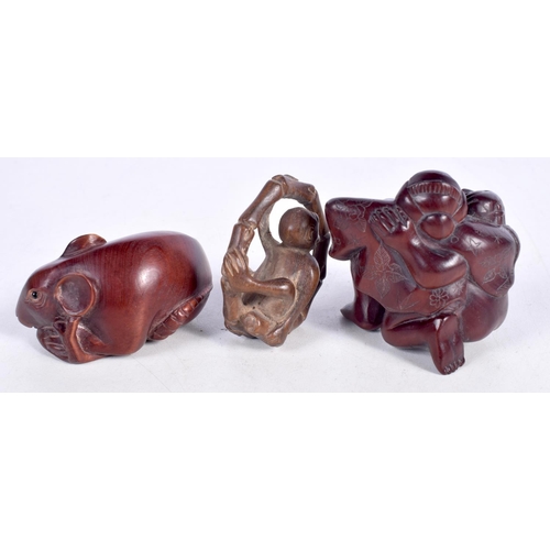 1600 - THREE JAPANESE CARVED BOXWOOD NETSUKES. Largest 5 cm x 4 cm. (3)