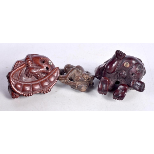 1600 - THREE JAPANESE CARVED BOXWOOD NETSUKES. Largest 5 cm x 4 cm. (3)