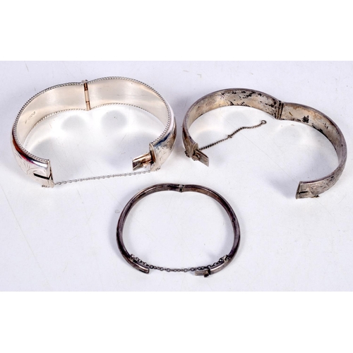 1641 - THREE SILVER BANGLES including Chester 1891. 61.4 grams. Largest 6 cm x 5.25 cm. (3)