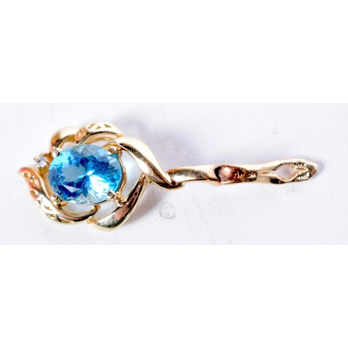 1642 - A YELLOW METAL BLUE STONE PENDANT. 3.7 grams. 3 cm x 1.5 cm.