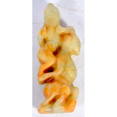 1647 - A CHINESE CARVED JADE EROTIC FIGURE. 47 grams. 7.75 cm x 1.5 cm.