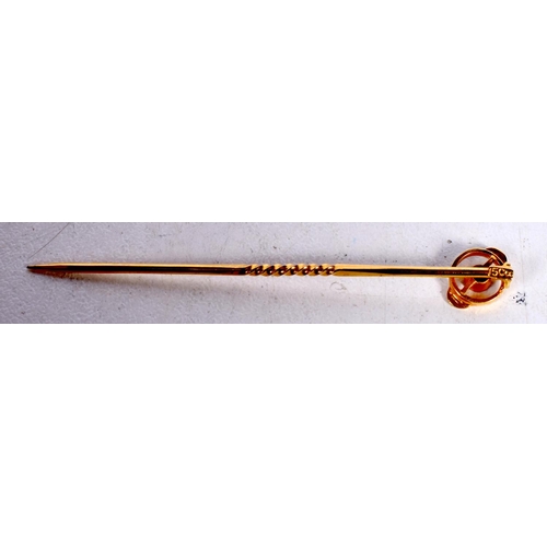 1650 - A LATE VICTORIAN 15CT GOLD AND SAPPHIRE TIE PIN. 1.1 grams. 6 cm long.