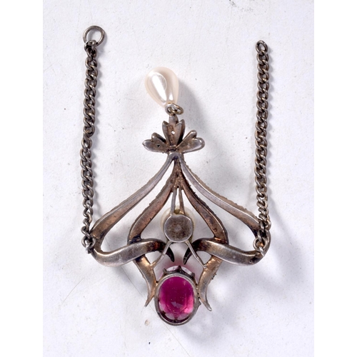 1654 - A STERLING SILVER ART NOUVEAU PEARL PENDANT. 9.7 grams. 6.5 cm x 4 cm.