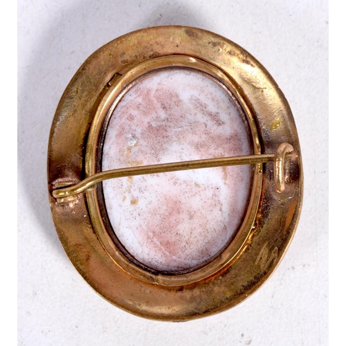 1662 - AN ANTIQUE YELLOW METAL AND ENAMEL CAMEO BROOCH. 8.7 grams. 4 cm x 3.5 cm.