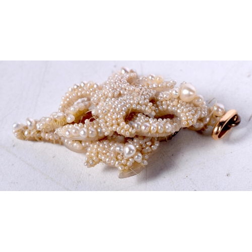 1671 - AN EARLY VICTORIAN SEED PEARL PENDANT. 5.7 grams. 6.25 cm x 3.5 cm.