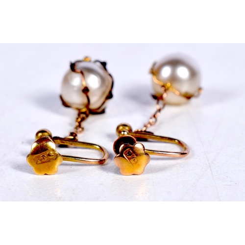 1679 - A PAIR OF EDWARDIAN 9CT GOLD AND PEARL EARRINGS. 1.2 grams. 3.5 cm x 1.25 cm.