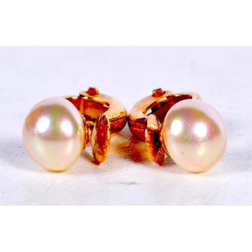 1692 - A PAIR OF 9CT GOLD AND PEARL EARRINGS. 2.3 grams. 1.5 cm x 0.75 cm.