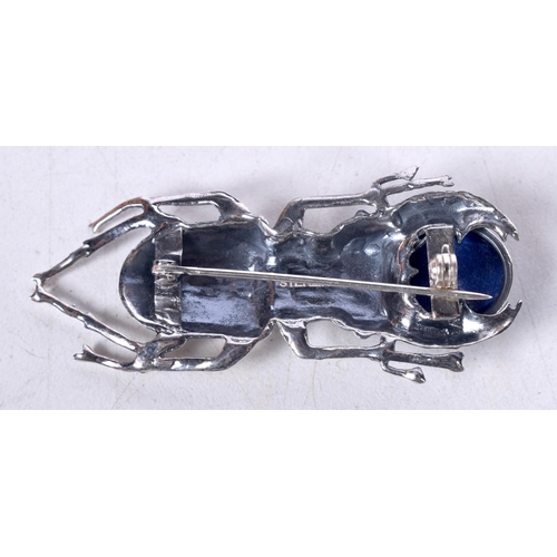 1702 - A SILVER SCARAB BEETLE. 13.1 grams. 5.5 cm x 2.5 cm.