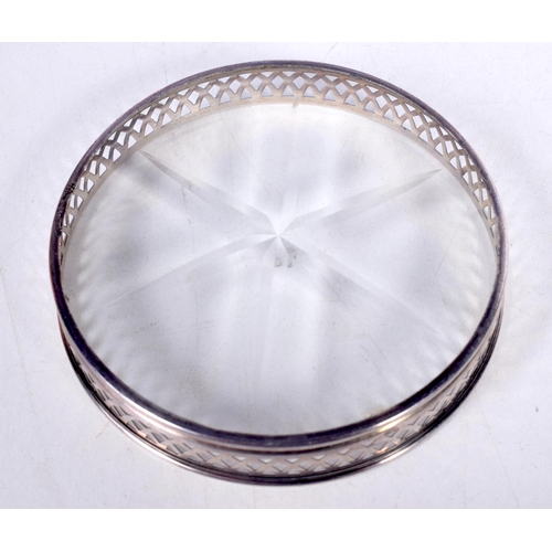 1707 - SIX SILVER AND GLASS COASTERS. 187 grams overall. 8 cm diameter. (6)