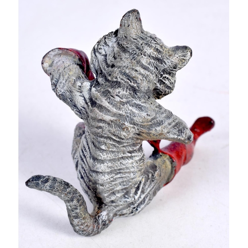 1709 - A COLD PAINTED BRONZE CAT. 290 grams. 9 cm x 7cm.