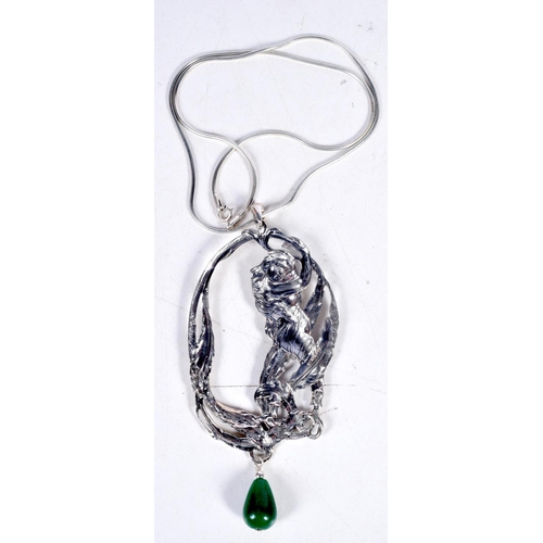 1715 - A SILVER AND JADE NECKLACE. 30 grams. Chain 44 cm long, pendant 10.5 cm x 4.75 cm.