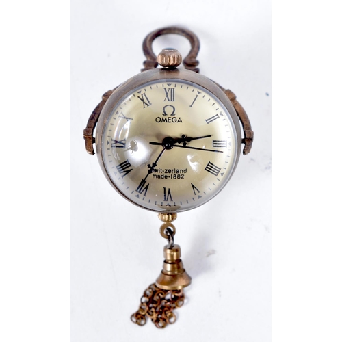 1718 - A MINI BALL CLOCK. 32 grams. 8 cm x 3.5 cm.