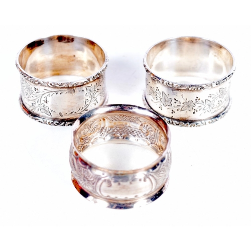 1720 - THREE ANTIQUE SILVER NAPKIN RINGS. 57 grams. 4.5 cm diameter. (3)