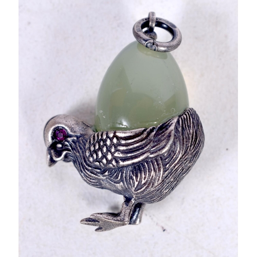 1750 - A RUSSIAN SILVER AND JADE EGG PENDANT. 7 grams. 2.75 cm x 2 cm.