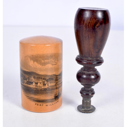 1752 - A MAUCHLINE WARE BOBBIN HOLDER together with a lignum vitae seal. 8.5 cm high. (2)