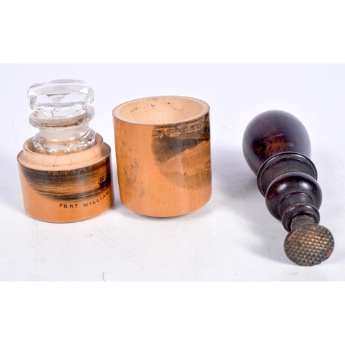 1752 - A MAUCHLINE WARE BOBBIN HOLDER together with a lignum vitae seal. 8.5 cm high. (2)