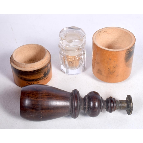 1752 - A MAUCHLINE WARE BOBBIN HOLDER together with a lignum vitae seal. 8.5 cm high. (2)