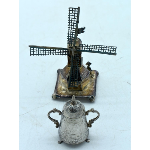 1769 - TWO CONTINENTAL SILVER ITEMS including a windmill & stein. 75 grams. Largest 10 cm x 5 cm. (2)