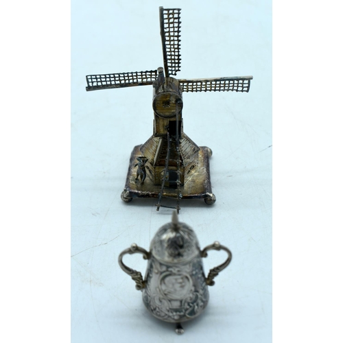 1769 - TWO CONTINENTAL SILVER ITEMS including a windmill & stein. 75 grams. Largest 10 cm x 5 cm. (2)