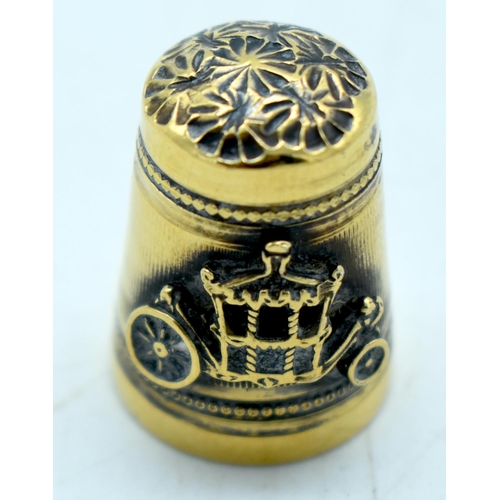 1771 - A VICTORIAN YELLOW METAL CARRIAGE THIMBLE. 6 grams. 2 cm high.