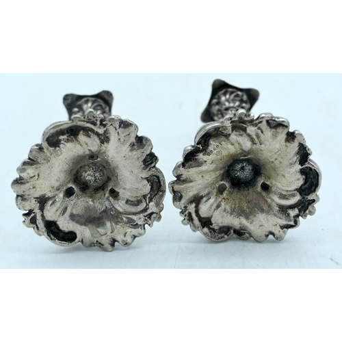 1775 - A SMALL PAIR OF ANTIQUE CONTINENTAL SILVER PLATED CANDLESTICKS. 421 grams. 11.5 cm high.