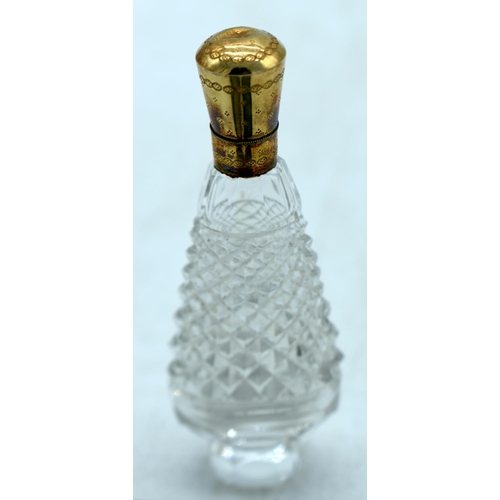 1841 - A CASED GLASS SCENT BOTTLE WITH 14CT GOLD MOUNTS. Stamped 14K. Bottle 10.1cm x 3.1cm