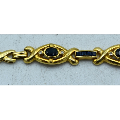 1843 - AN 18CT GOLD BRACELET SET WITH SAPPHIRES.  Stamped 750   18K, Length 18cm, weight 11.4g