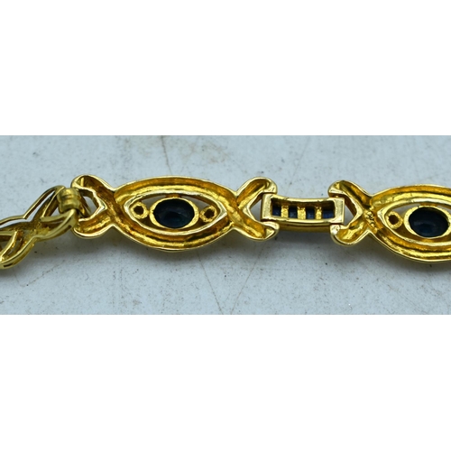 1843 - AN 18CT GOLD BRACELET SET WITH SAPPHIRES.  Stamped 750   18K, Length 18cm, weight 11.4g