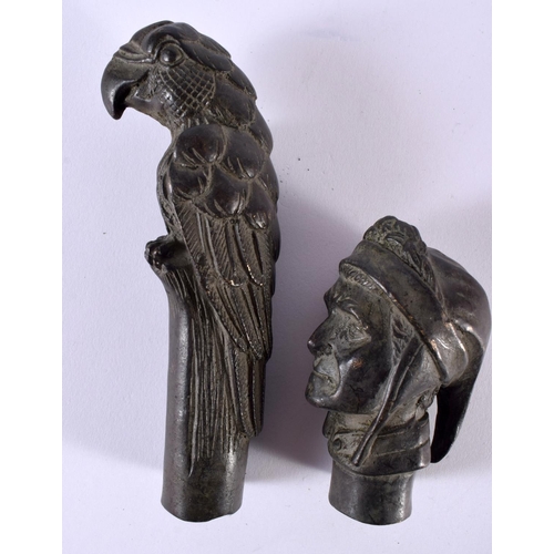 1856 - TWO BRONZE WALKING STICK HANDLE IN THE FORM OF A PARROT AND A TURKS HEAD.  lARGEST 13cm x 3.7cm x 4.... 