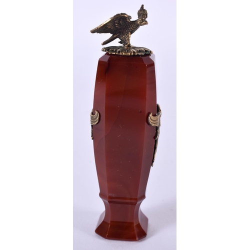 1867 - AN AGATE SEAL WITH SILVER GILT FIGURES AND TOPPED WITH AN EAGLE.  8.3cm x 2.3cm, weight 66g