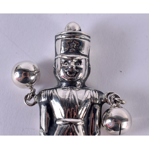 1875 - A SILVER BABIES RATTLE IN THE FORM OF A SOLDIER.  Stamped Sterling, 13.3cm x 4cm x 1.1cm, weight 22.... 