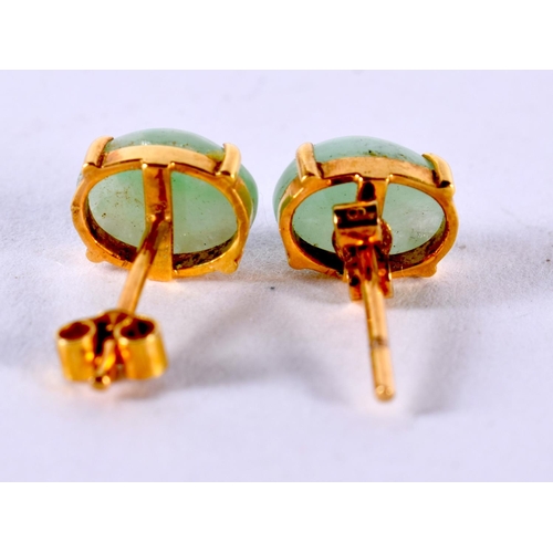 1876 - A BOXED PAIR OF JADE STUD EARRINGS.  0.8 cm x 0.6 cm, weight 1.5g