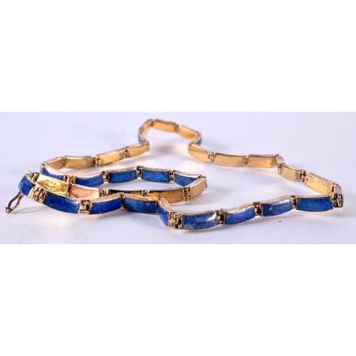 1878 - A SILVER GILT AND LAPIS NECKLACE.  44cm long, weight 23.2g