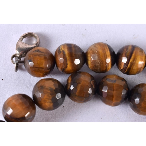 1890 - A TIGERS EYE BEAD NECKLACE.  45cm long, Largest bead 15.4mm, weight 76g