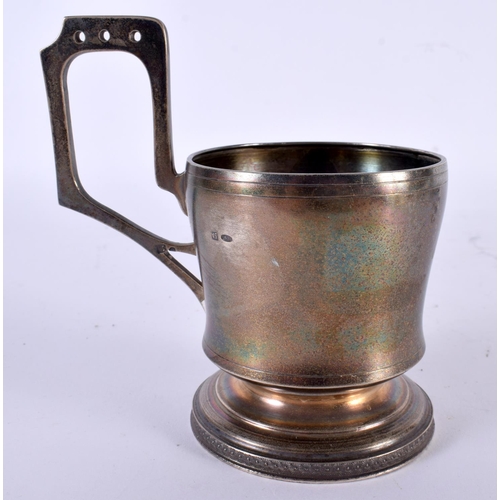 1892 - A CONTINENTAL SILVER CUP HOLDER.  Stamped 84, 12.7cm x 11.7cm x 7.8 cm, weight 159g