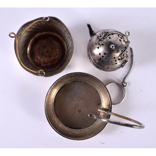 1898 - TWO WHITE METAL TEA INFUSERS.  Largest 8.2 cm x 6 cm, total weight 72g (2)