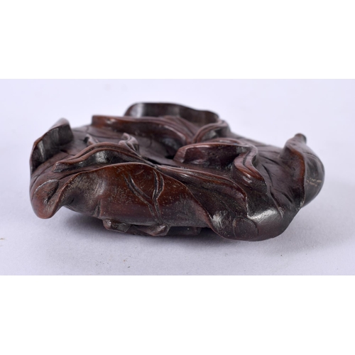 1899 - A CHINESE CARVED HARDWOOD LEAF.  7.2 cm x 7cm x 1.8 cm