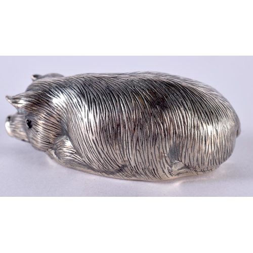 1909 - A CONTINENTAL SILVER MODEL OF A PIG.  Stamped 88, 6 cm x 2.3cm x 3.2 cm, weight 30.1g