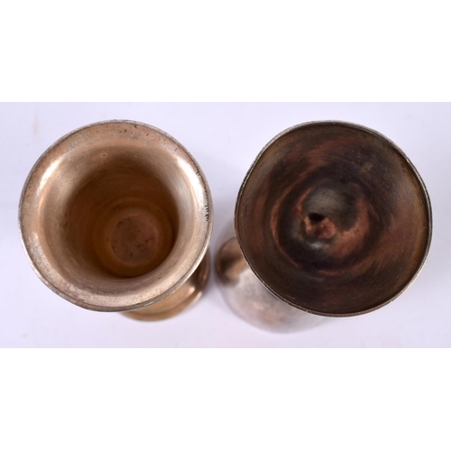 1912 - TWO WHITE METAL DRINKS MEASURE CUPS.  Largest 10.9cm x 4.6 cm (2)