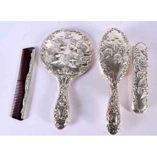 1939 - AN ENGLISH SILVER DRESSING TABLE SET. 630 grams overall. Largest 21 cm x 11.5 cm. (4)