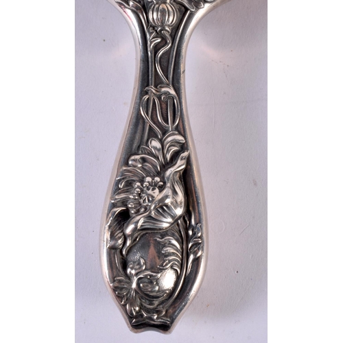 1947 - AN ART NOUVEAU SILVER PLATED HAND MIRROR. 380 grams overall. 24.5 cm x 13.5 cm.