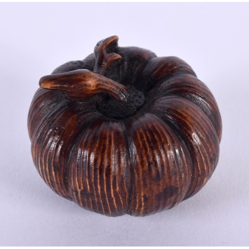 2008 - A 19TH CENTURY JAPANESE CARVED WOOD PUMPKIN NETSUKE of naturalistic form. 3.25 cm x 3.25 cm.