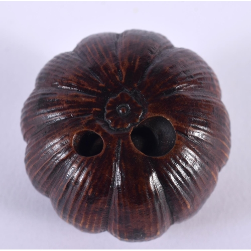 2008 - A 19TH CENTURY JAPANESE CARVED WOOD PUMPKIN NETSUKE of naturalistic form. 3.25 cm x 3.25 cm.