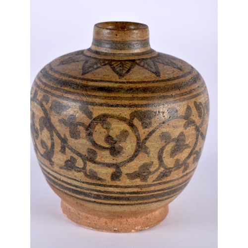 2014 - AN EARLY SOUTHEAST ASIAN POTTERY VESSEL possibly Vietnamese, painted with floral scrolls. 10 cm x 7c... 