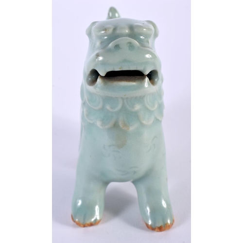 2015 - A 19TH CENTURY KOREAN CELADON GLAZED PORCELAIN BEAST modelled scowling. 9 cm x 9 cm.