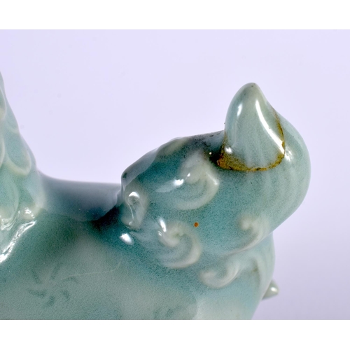 2015 - A 19TH CENTURY KOREAN CELADON GLAZED PORCELAIN BEAST modelled scowling. 9 cm x 9 cm.