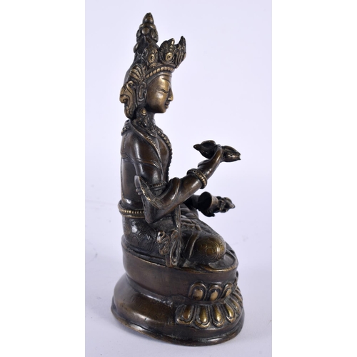 2048 - A 19TH CENTURY TIBETAN NEPALESE BRONZE FIGURE OF A SEATED BUDDHA modelled holding buddhistic items, ... 